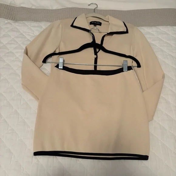 Chic Cream Top and Mini Skirt with Black Accents - Picture 5 of 10